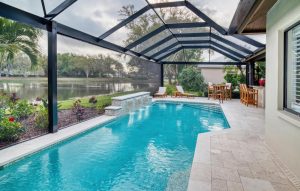 new pool construction lakefront screened enclosure outdoor dining florida