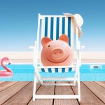 Piggy bank relaxing beside a swimming pool representing the cost to resurface a pool and plan a renovation budget